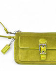 Image 2 (Top View with Strap):
Top-down view of Coach lime green suede wristlet with wrist strap and buckle-front pocket, including Coach tag detail.