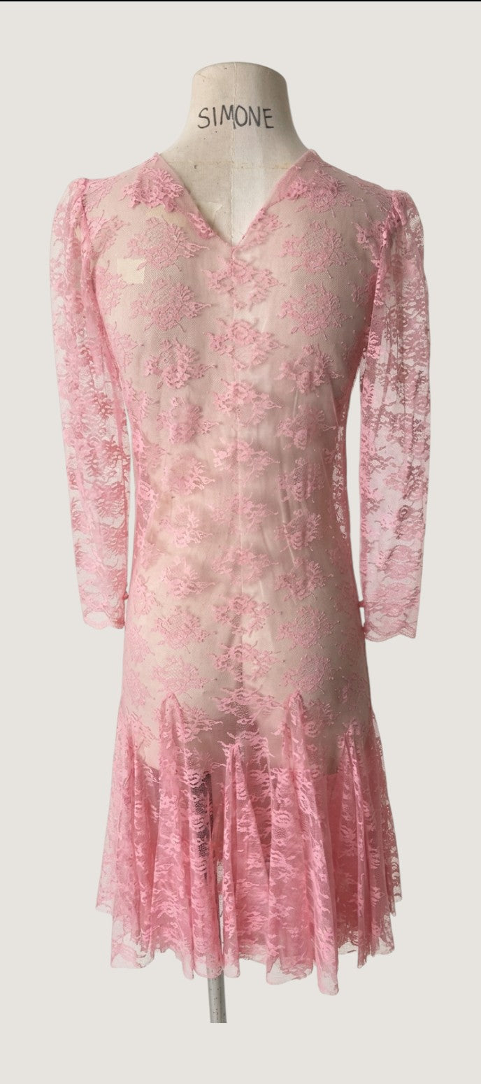LaliSimone blush pink lace dress with scalloped collar and sleeves, godet skirt, and pearl button back closure. Vintage 1950s.