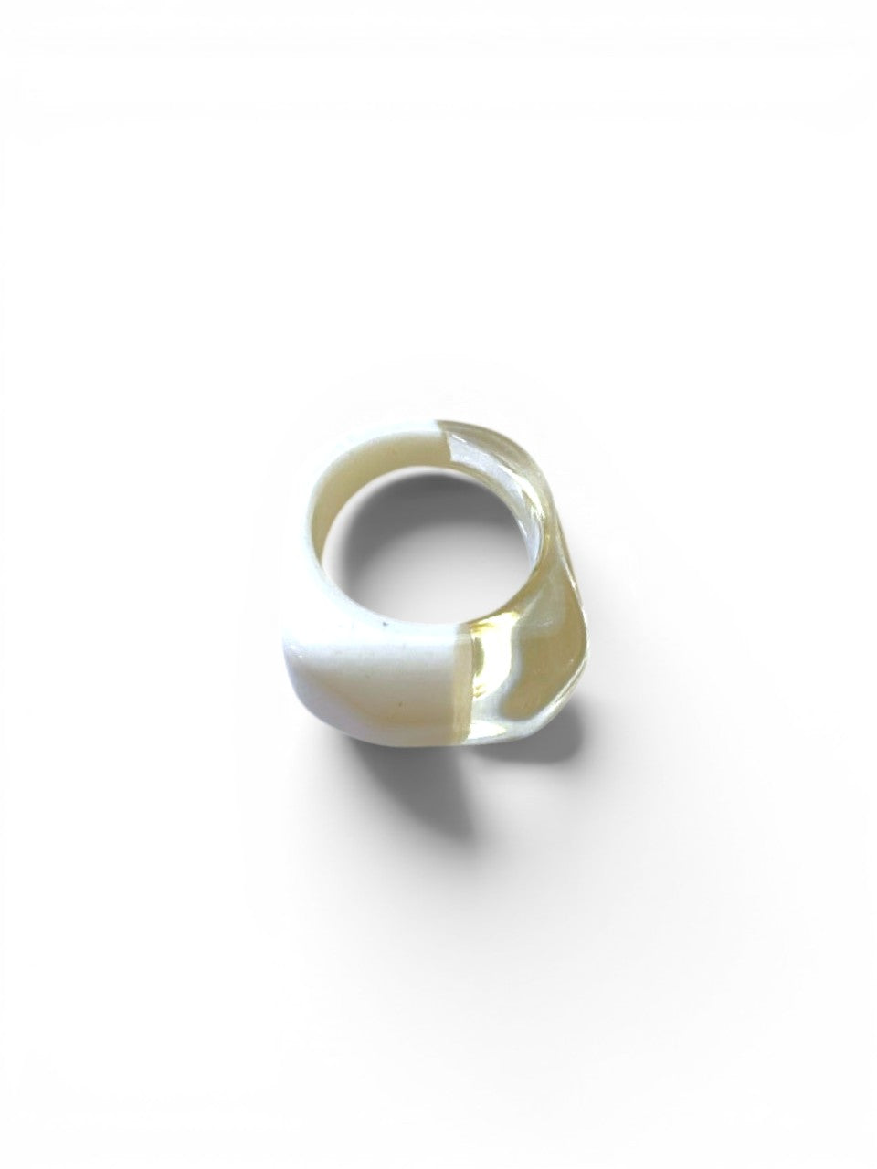 LaliSimone two-tone acrylic ring, featuring a chunky white opaque band transitioning to a clear, faceted band.