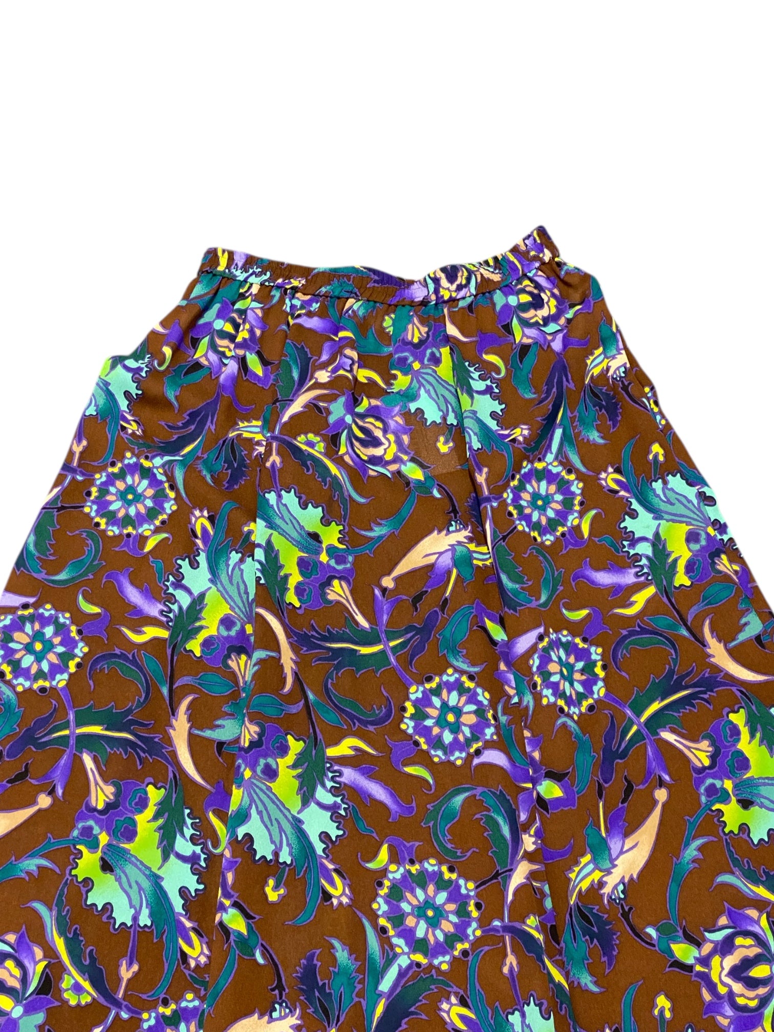 Skirt with a colorful floral pattern on a brown background