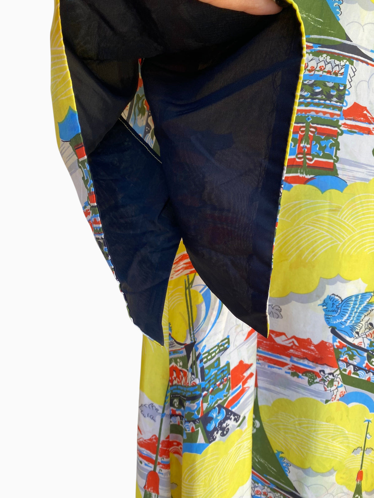 LaliSimone vintage 1940s yellow rayon Pake Muu dress featuring a pagoda novelty print and black kimono sleeve lining