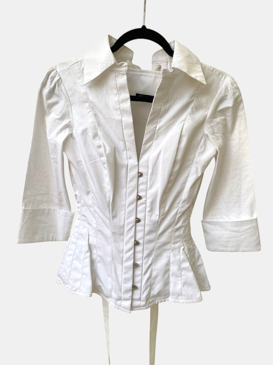 Corsetted white poplin shirt — front view showing crisp fabric and clean silhouette