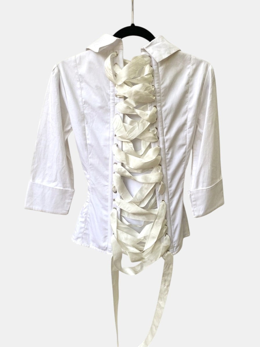 Corsetted white poplin shirt — back view showing adjustable ribbon corset lacing detail