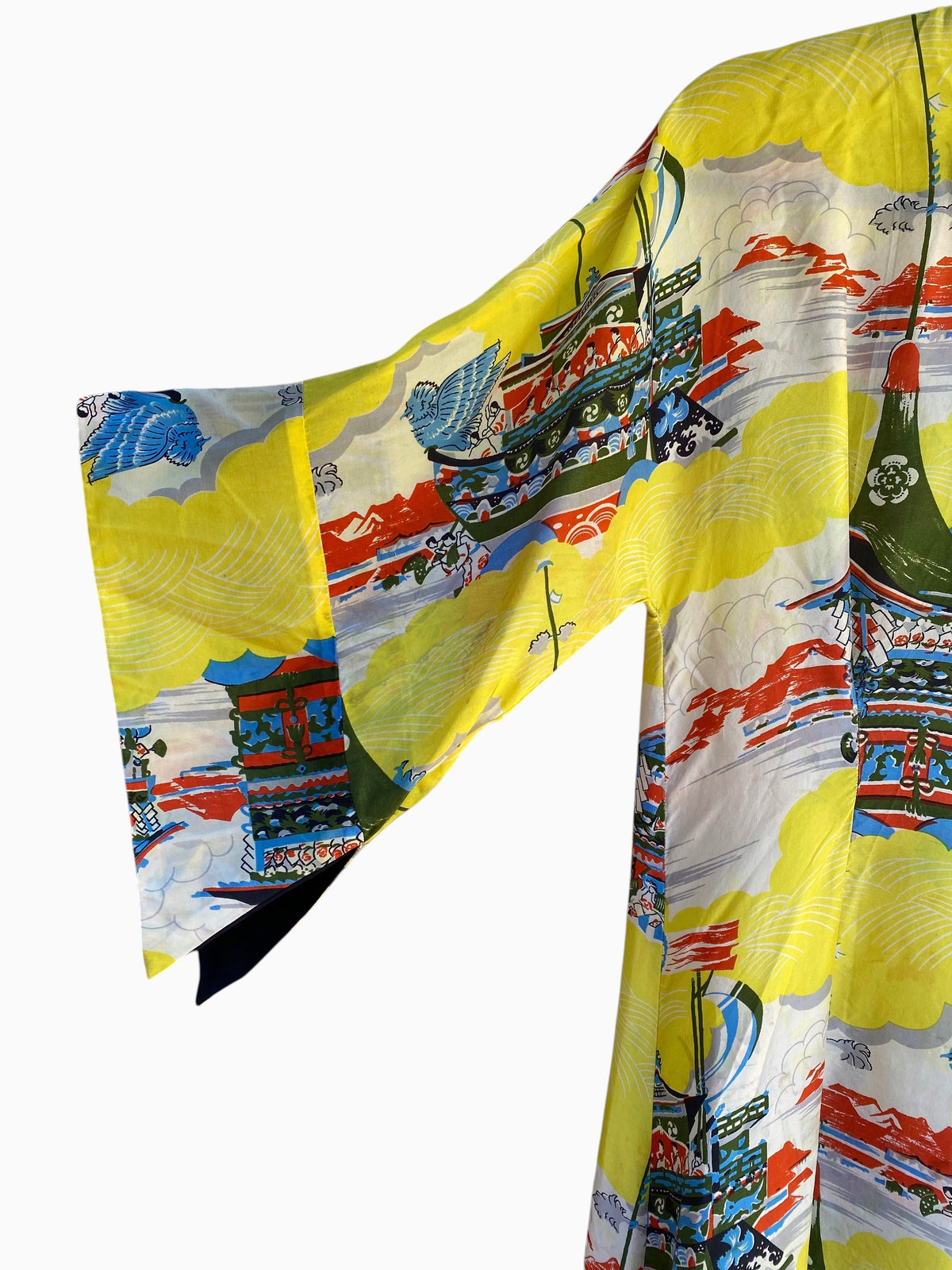 LaliSimone vintage 1940s yellow rayon Pake Muu dress featuring a colorful pagoda and bird novelty print kimono sleeve