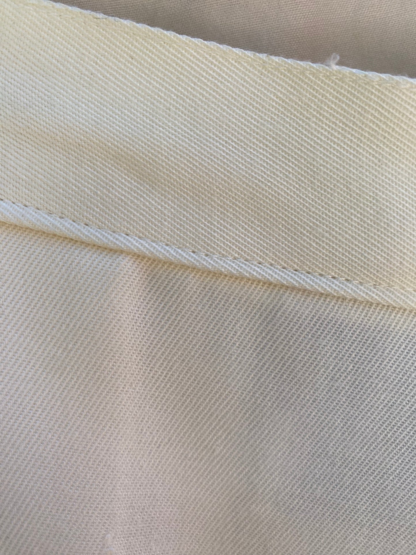 Ivory pleated knickers — back view showing fit and fabric drape