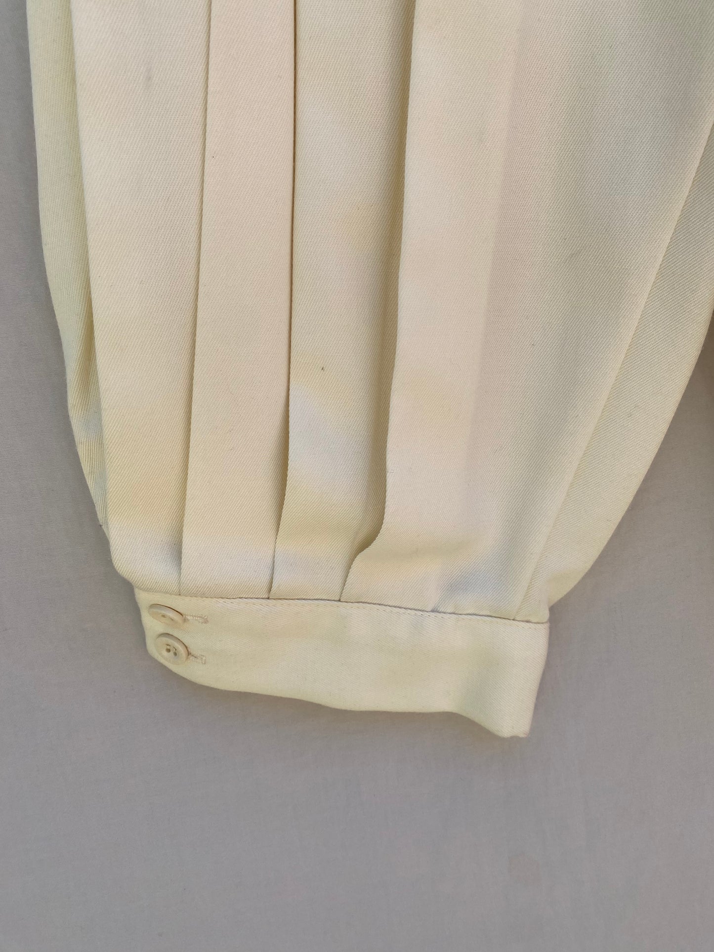 Ivory pleated knickers — close-up of pleat detail and waistband