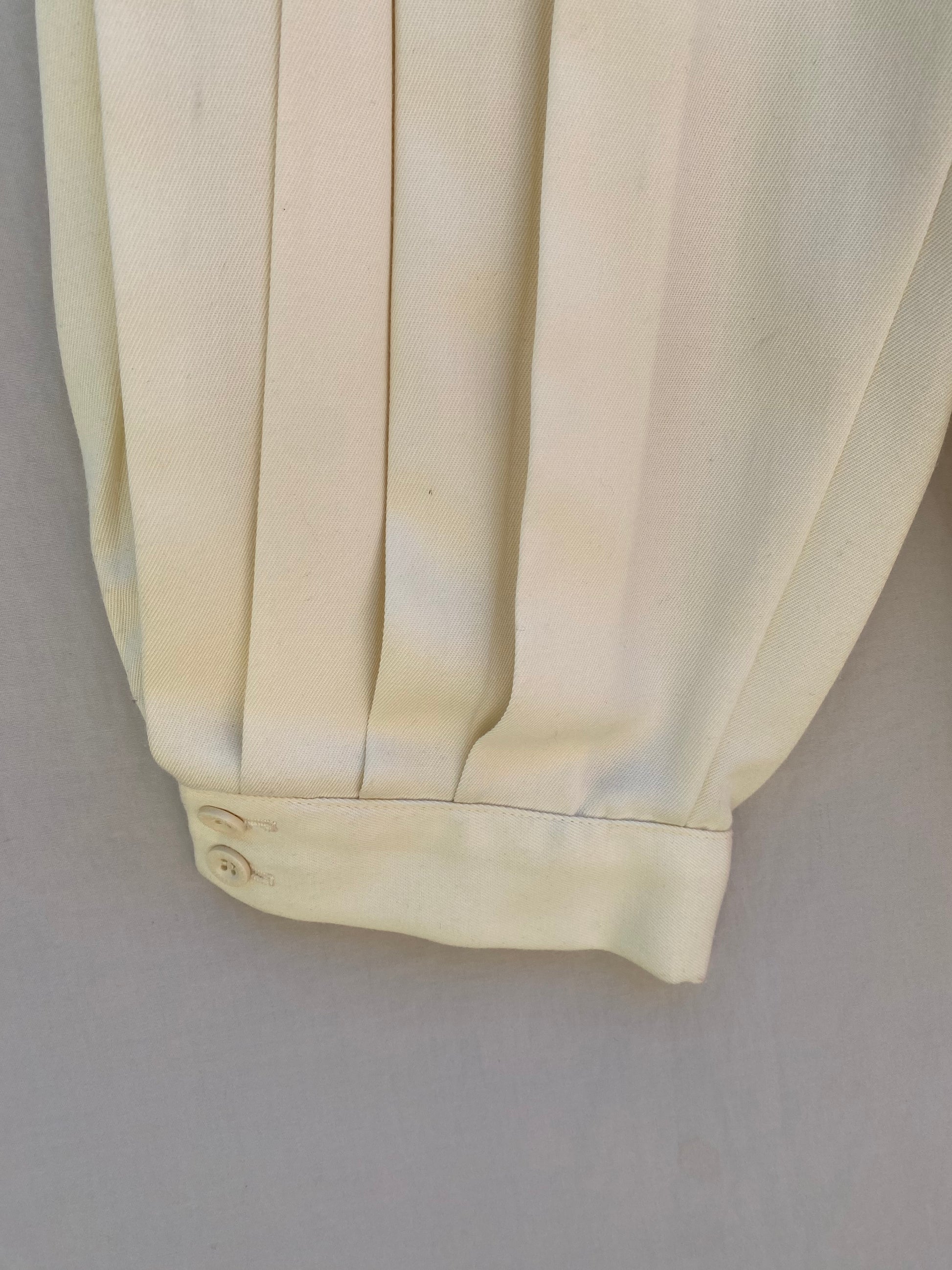 Ivory pleated knickers — close-up of pleat detail and waistband