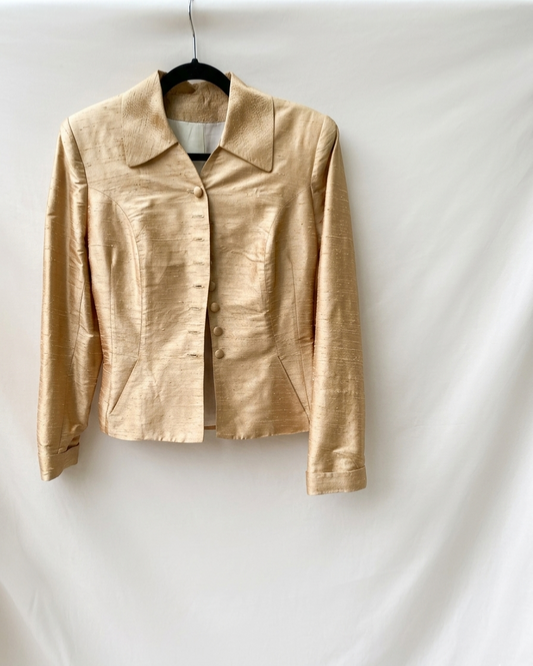 Bespoke champagne gold jacket — front view showing lustrous gold tone and structured tailoring