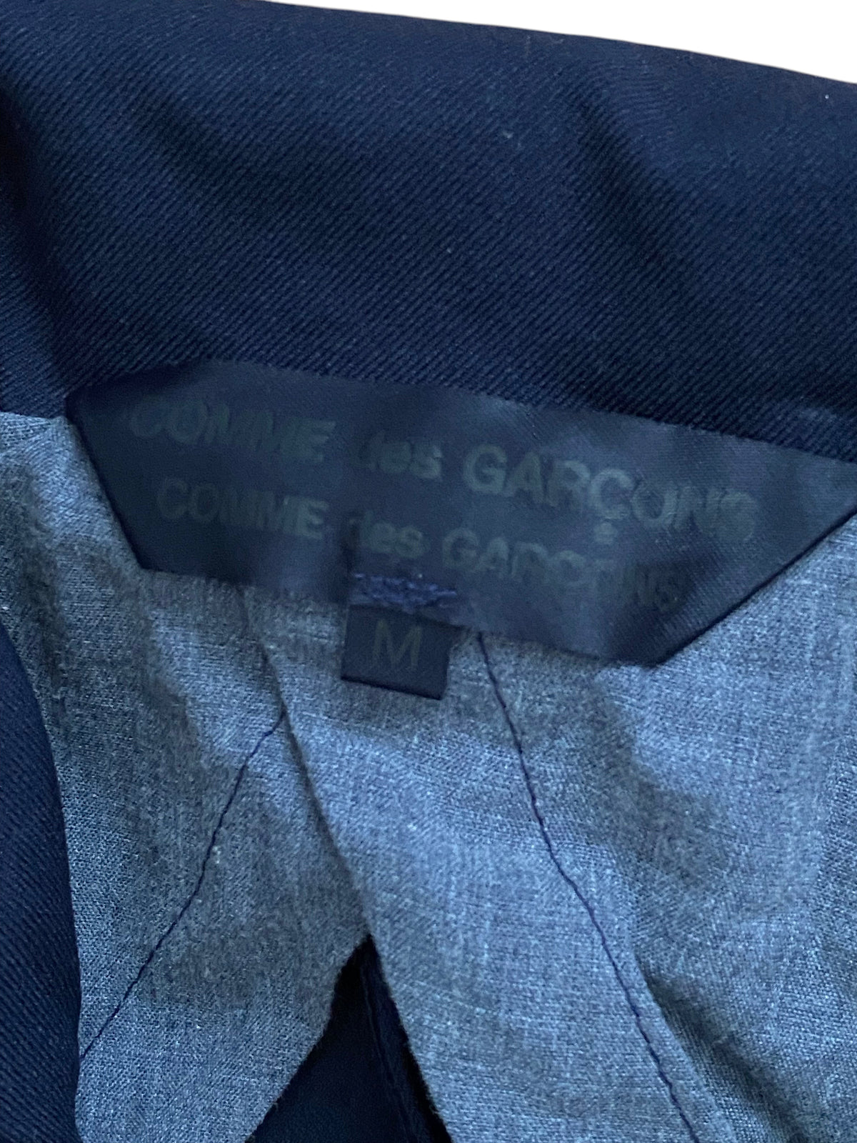 LaliSimone COMME des GARÇONS vintage navy jacket label showing size M and gray lining