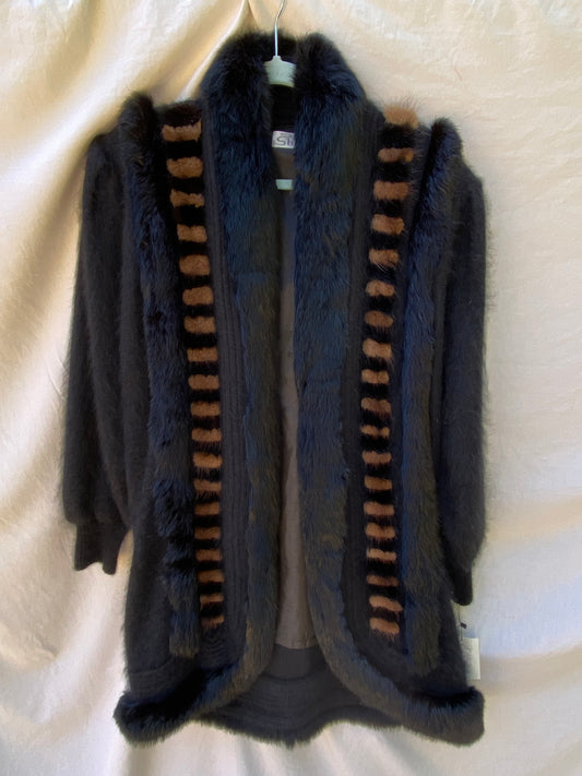 Front view of a vintage Shine black angora knit coat with fur shawl collar and striped fur front bands