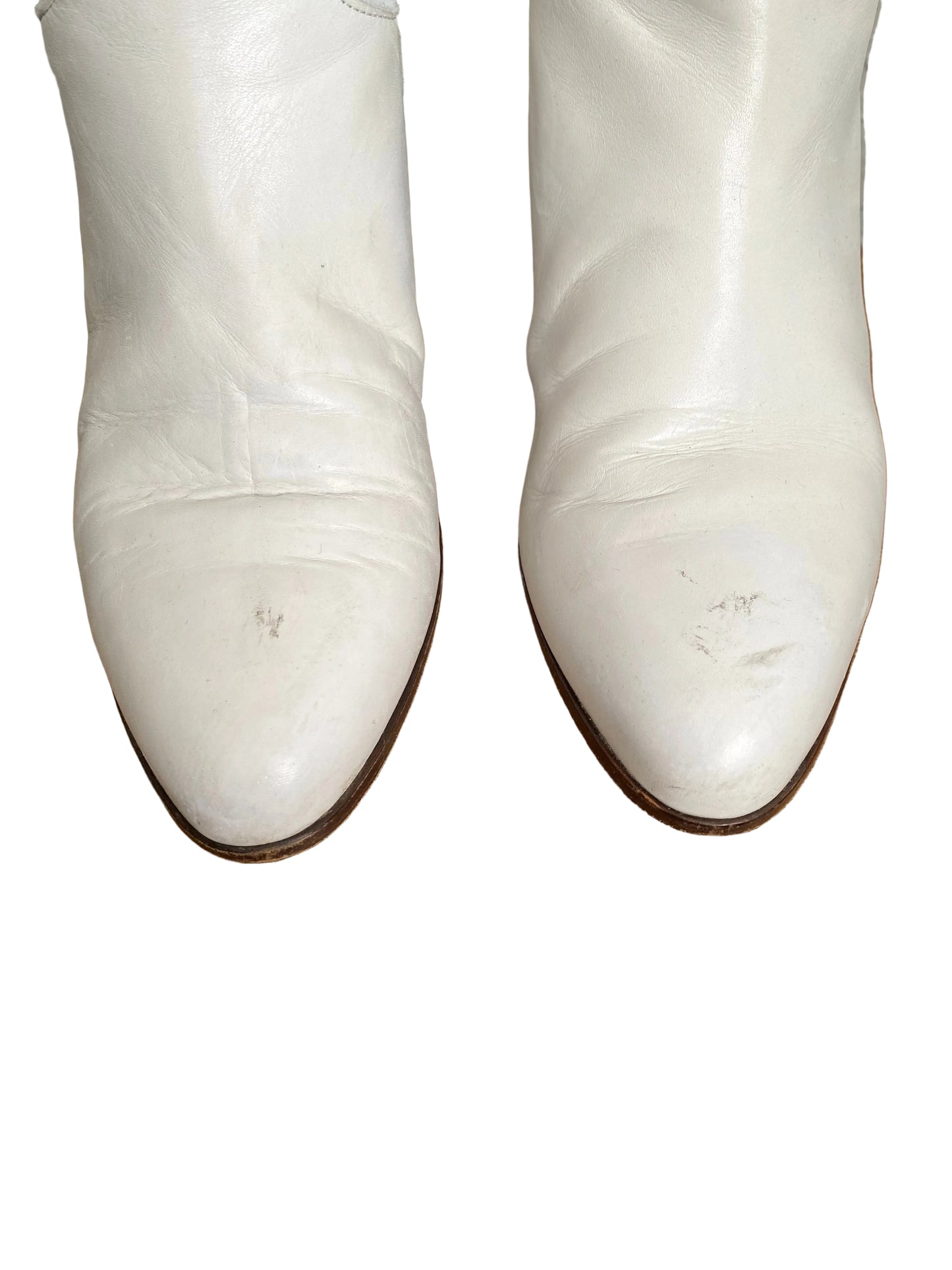 White rhinestone western boots — side profile view showing shaft and heel