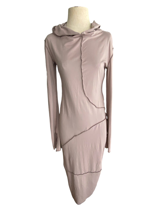 Taupe hooded dress with reverse exposed seams — front view showing silhouette and hood