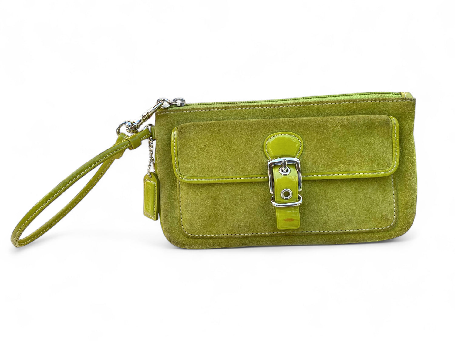 Image 1 (Front View):
Coach lime green suede wristlet with patent leather front pocket and buckle strap, shown with attached wrist strap and Coach hang tag.