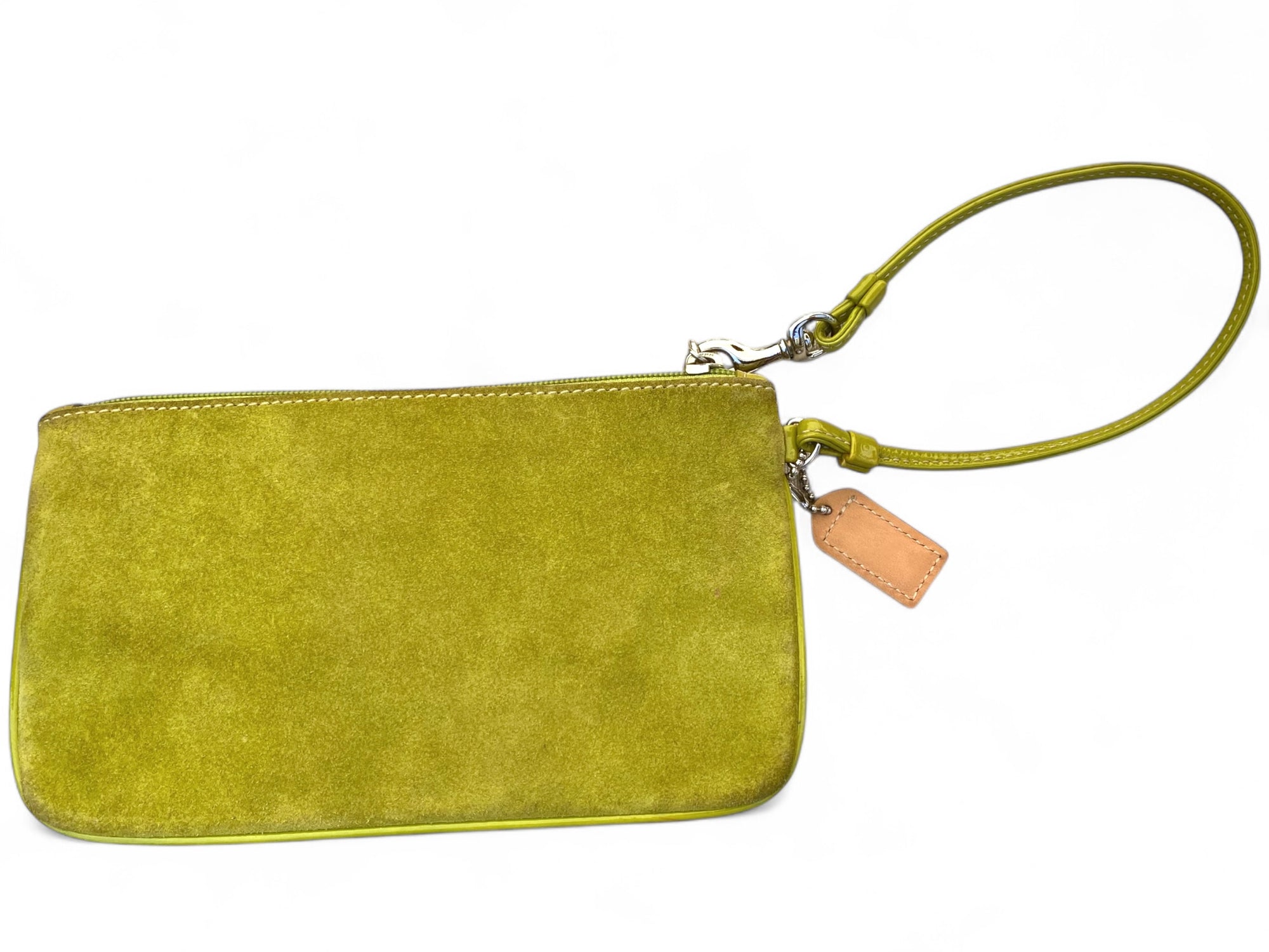 Image 4 (Back View):
Back view of Coach lime green suede wristlet showing clean suede surface and wrist strap with neutral Coach tag.