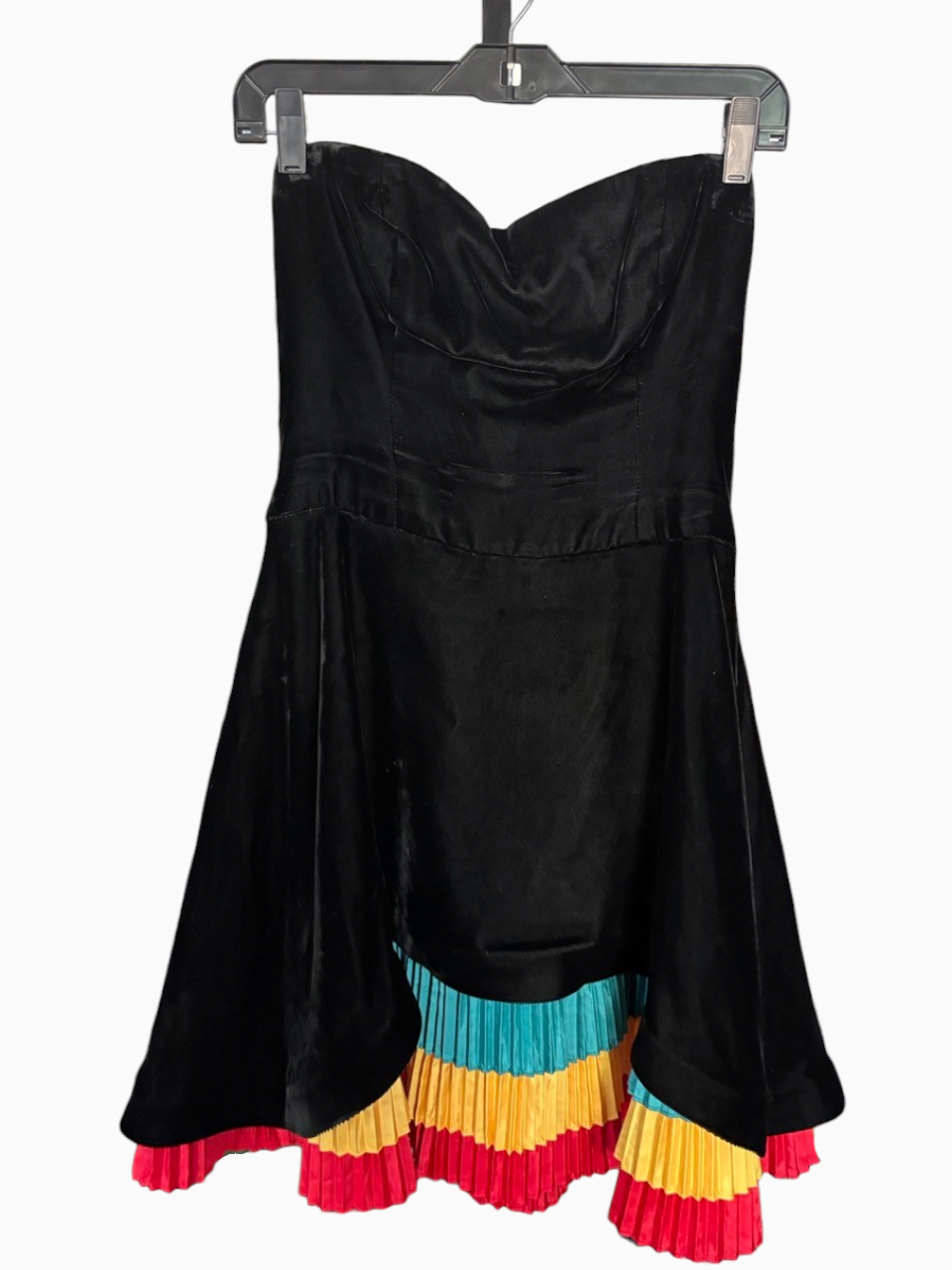 LaliSimone black velvet strapless cocktail dress featuring multi-colored knife-pleated layers at the hem.