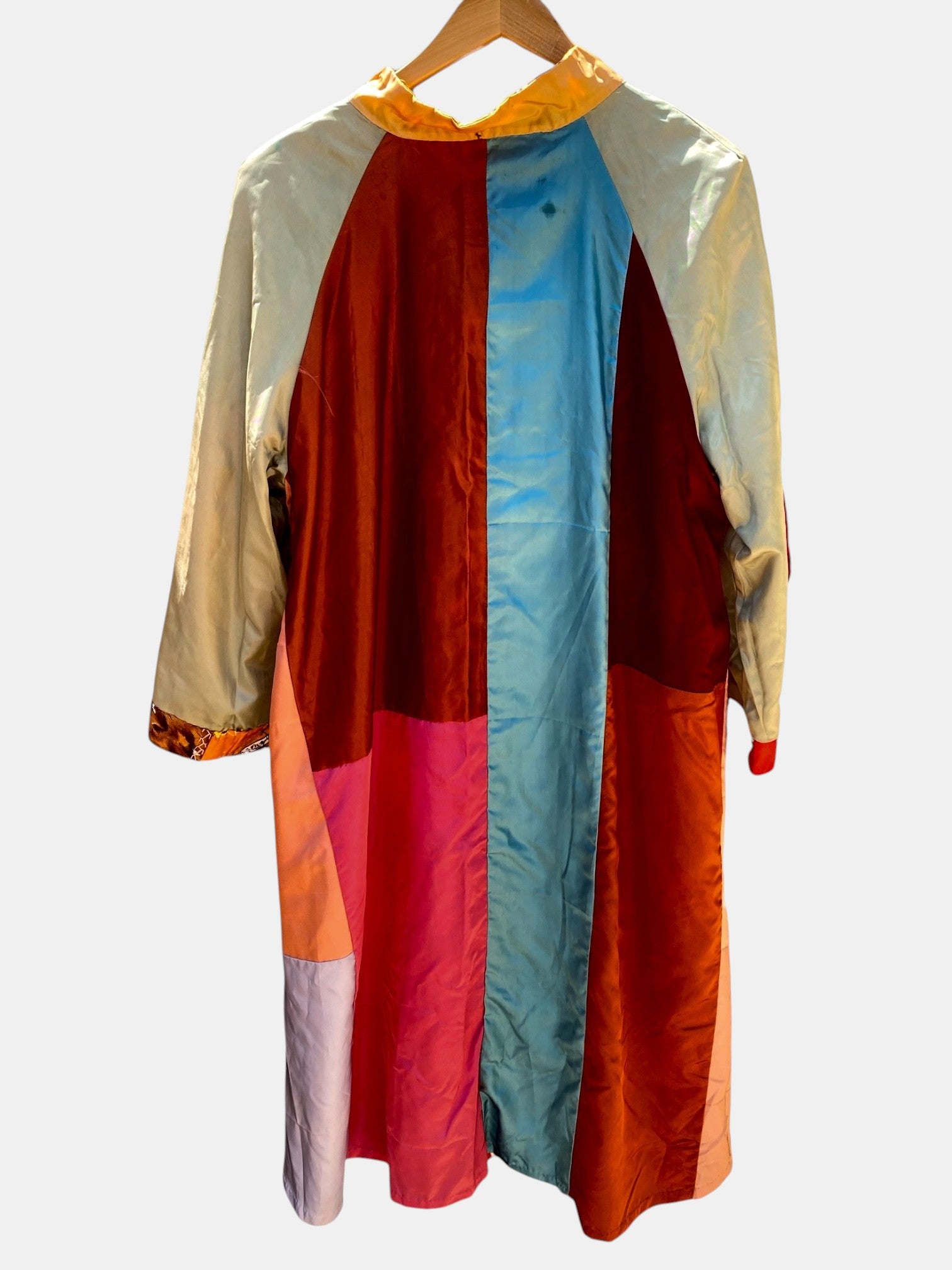 LaliSimone antique hand-sewn quilted patchwork duster coat in multicolor satin with a yellow collar.