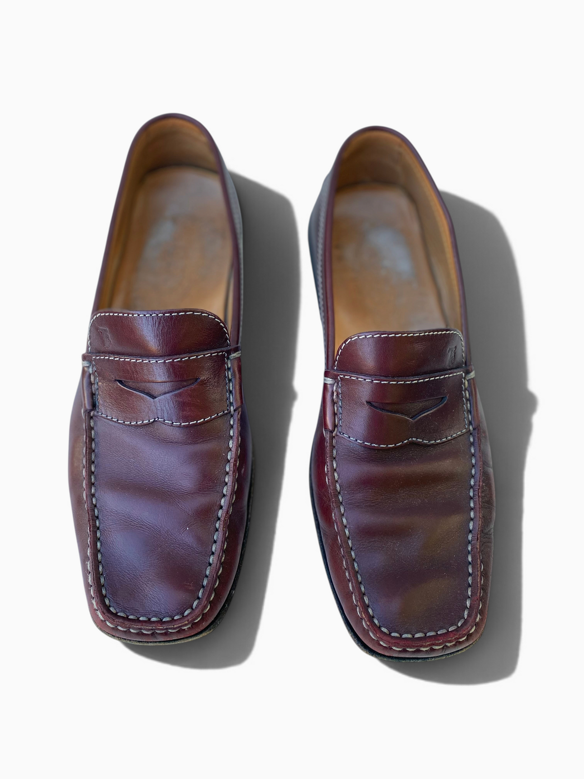 LaliSimone vintage Tod's oxblood leather penny loafers with square toe and white contrast stitching