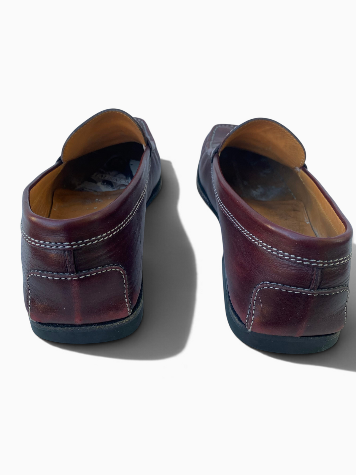 LaliSimone vintage Tod's oxblood leather penny loafers with white contrast stitching and square toe design.