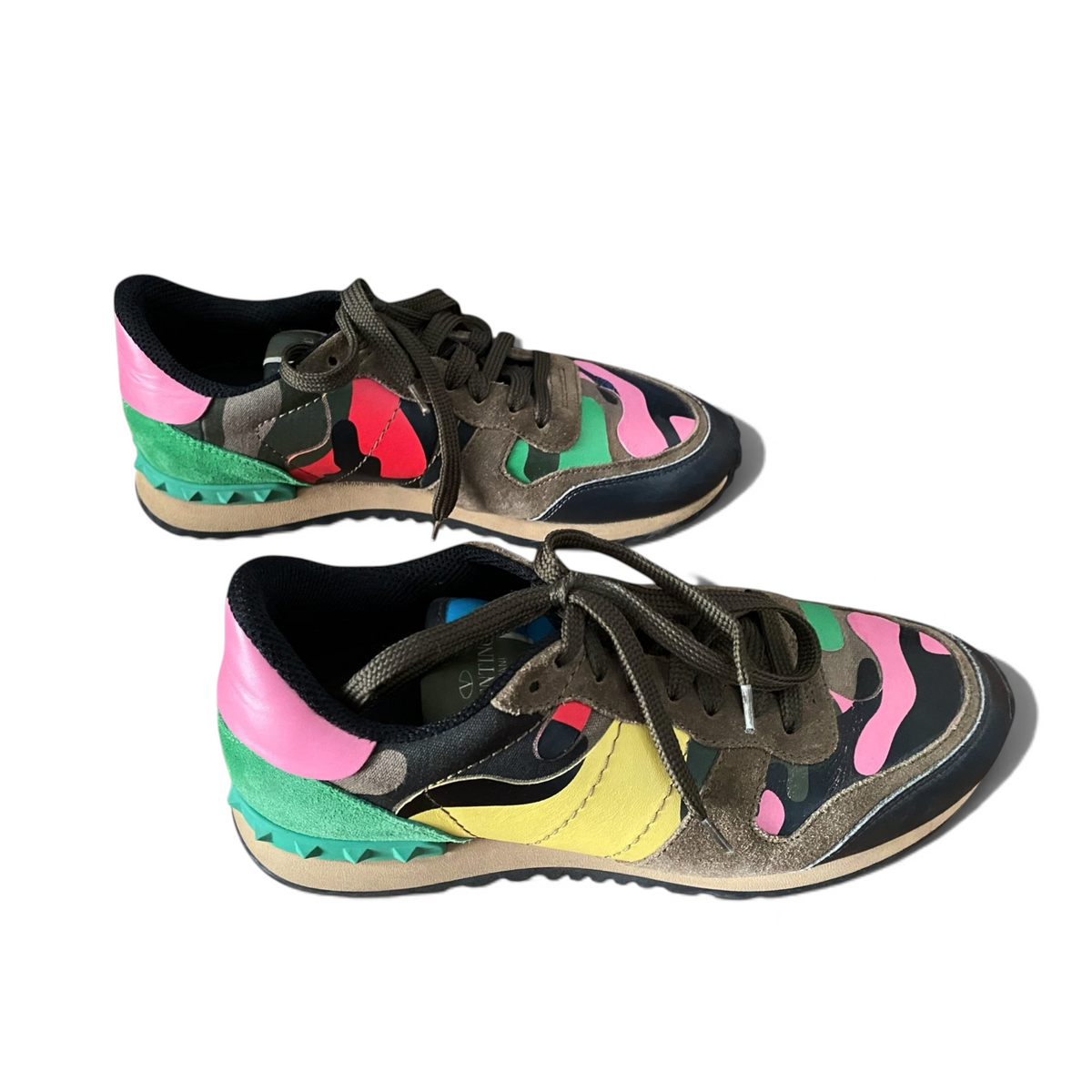 LaliSimone Valentino Garavani low top lace up sneakers featuring a vibrant multi-colored camouflage pattern and suede.