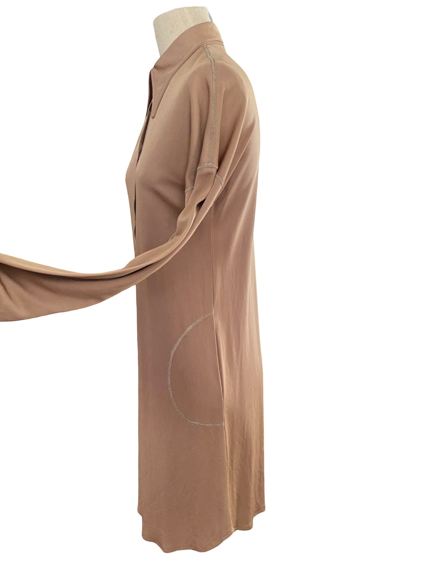 LaliSimone bronze jersey shirt dress with long sleeves and contrast stitching detail on pockets.