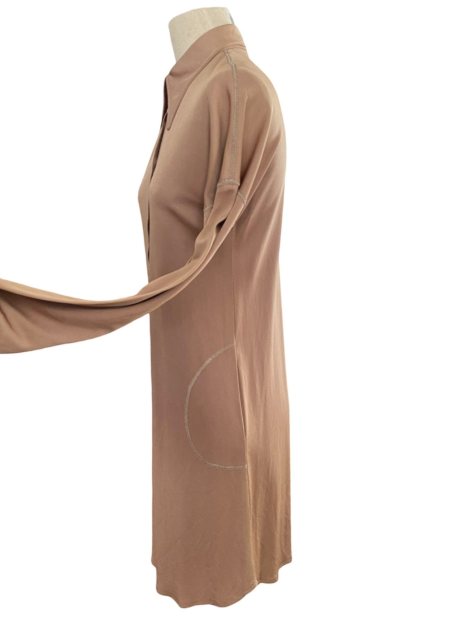 LaliSimone bronze jersey shirt dress with long sleeves and contrast stitching detail on pockets.