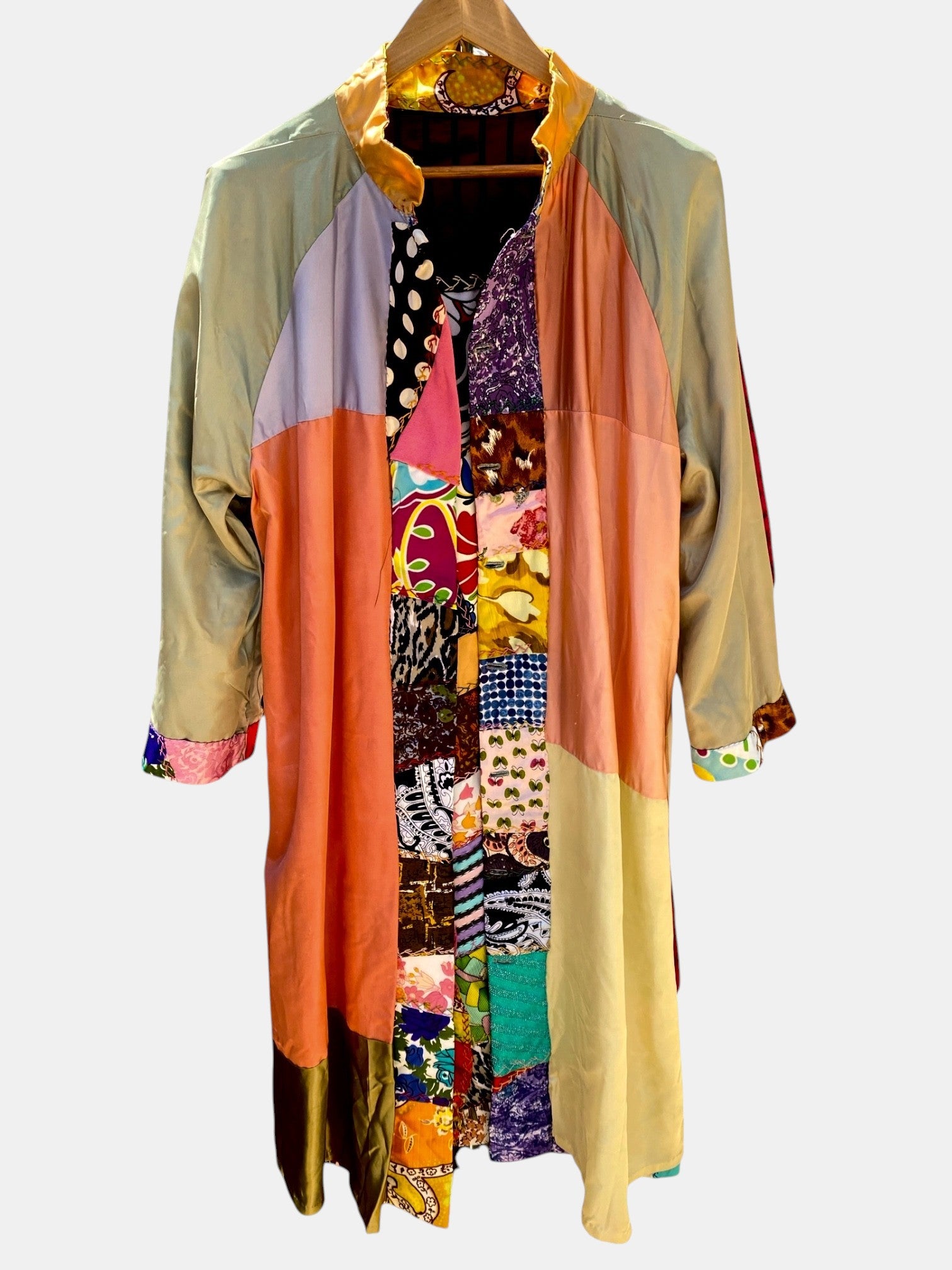 LaliSimone antique hand sewn quilted patchwork duster coat in multicolor fabric panels with floral and geometric prints.