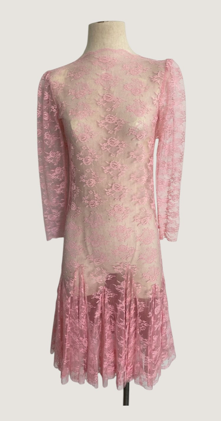 LaliSimone blush pink lace dress with sheer long sleeves, round collar, and godet skirt. Vintage 1950s style.