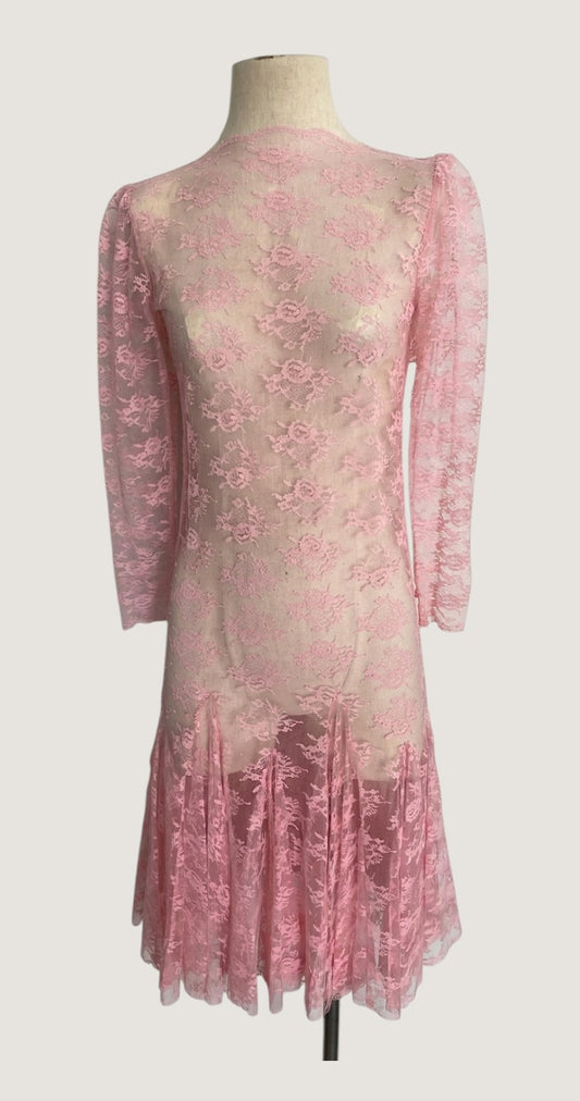 LaliSimone blush pink lace dress with sheer long sleeves, round collar, and godet skirt. Vintage 1950s style.