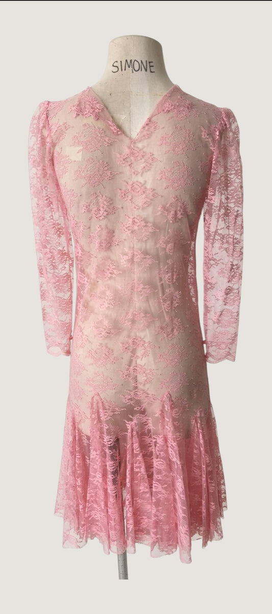 LaliSimone blush pink lace dress with scalloped collar and sleeves, godet skirt, and pearl button back closure. Vintage 1950s.