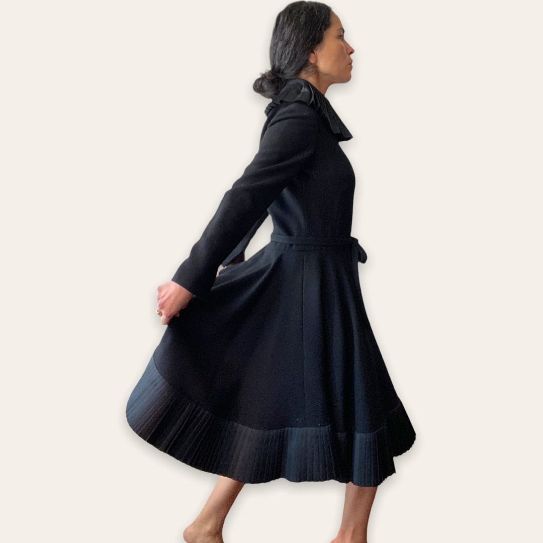 Geoffrey Beene black cocktail dress — three-quarter view showing trapeze collar and full skirt