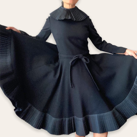 Archival 1960s Geoffrey Beene black cocktail dress — front view showing full silhouette and silk collar