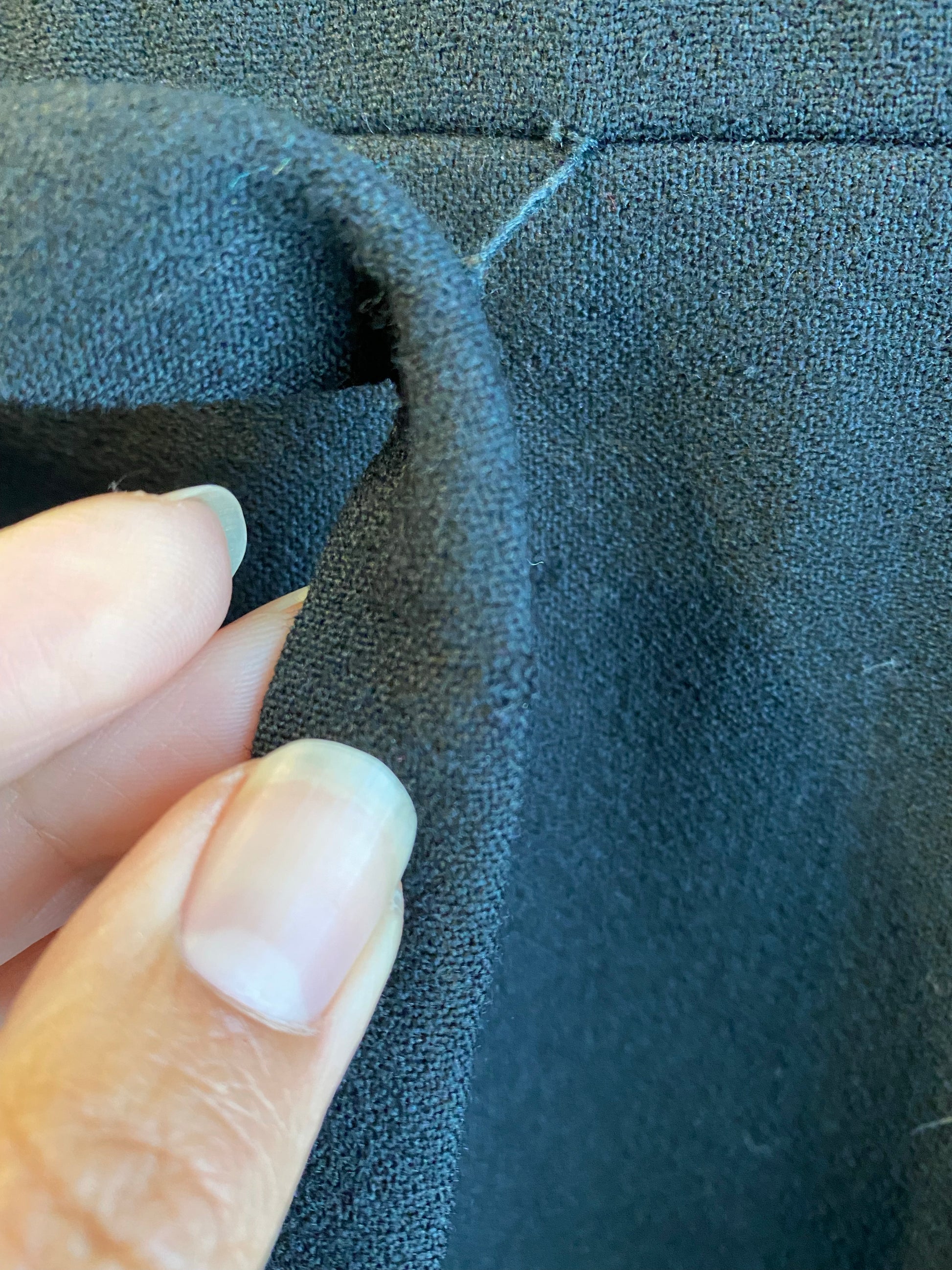 Geoffrey Beene dress — skirt detail and hem pleating close-up