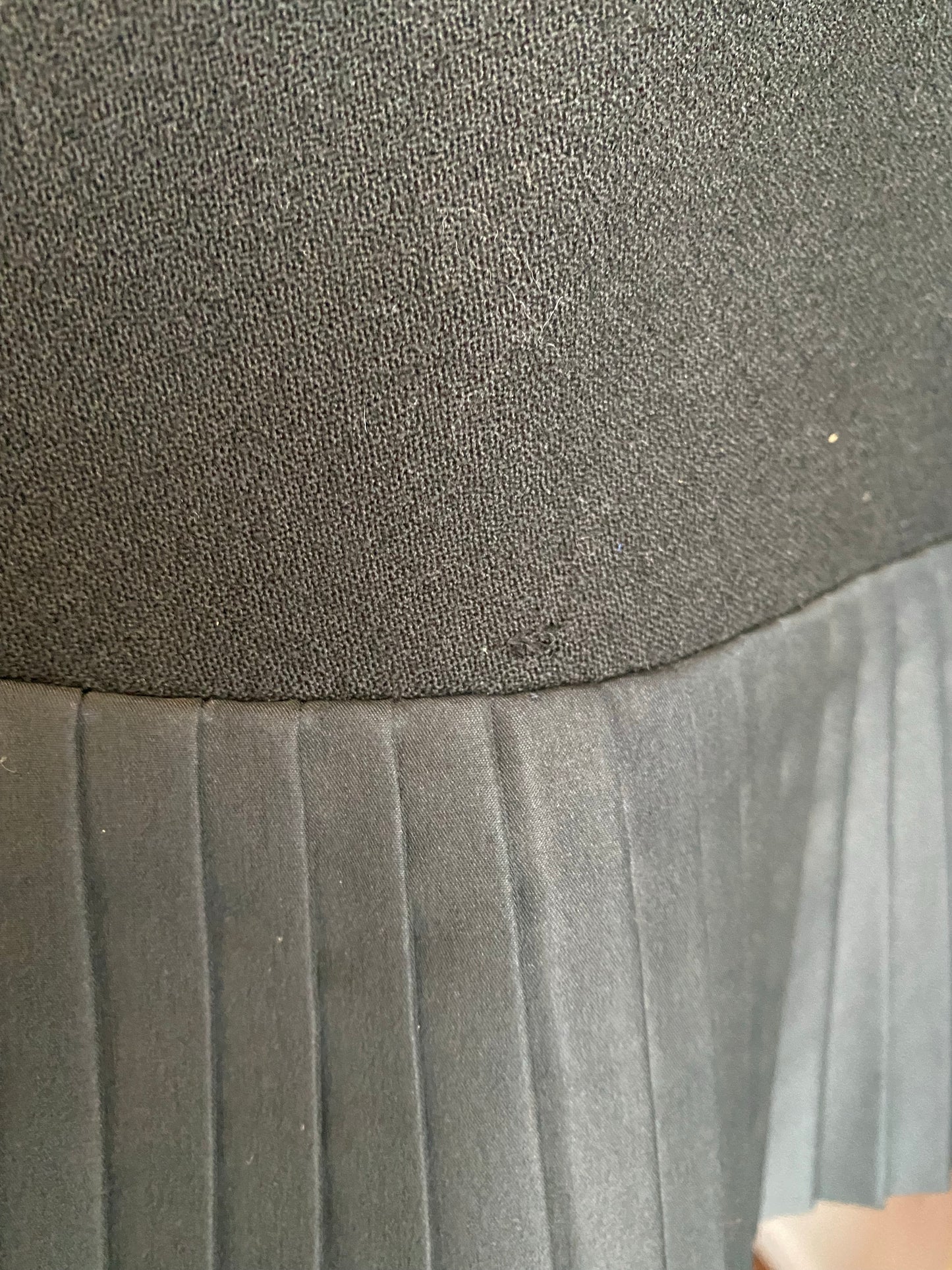 Geoffrey Beene dress — hem and pleating detail close-up