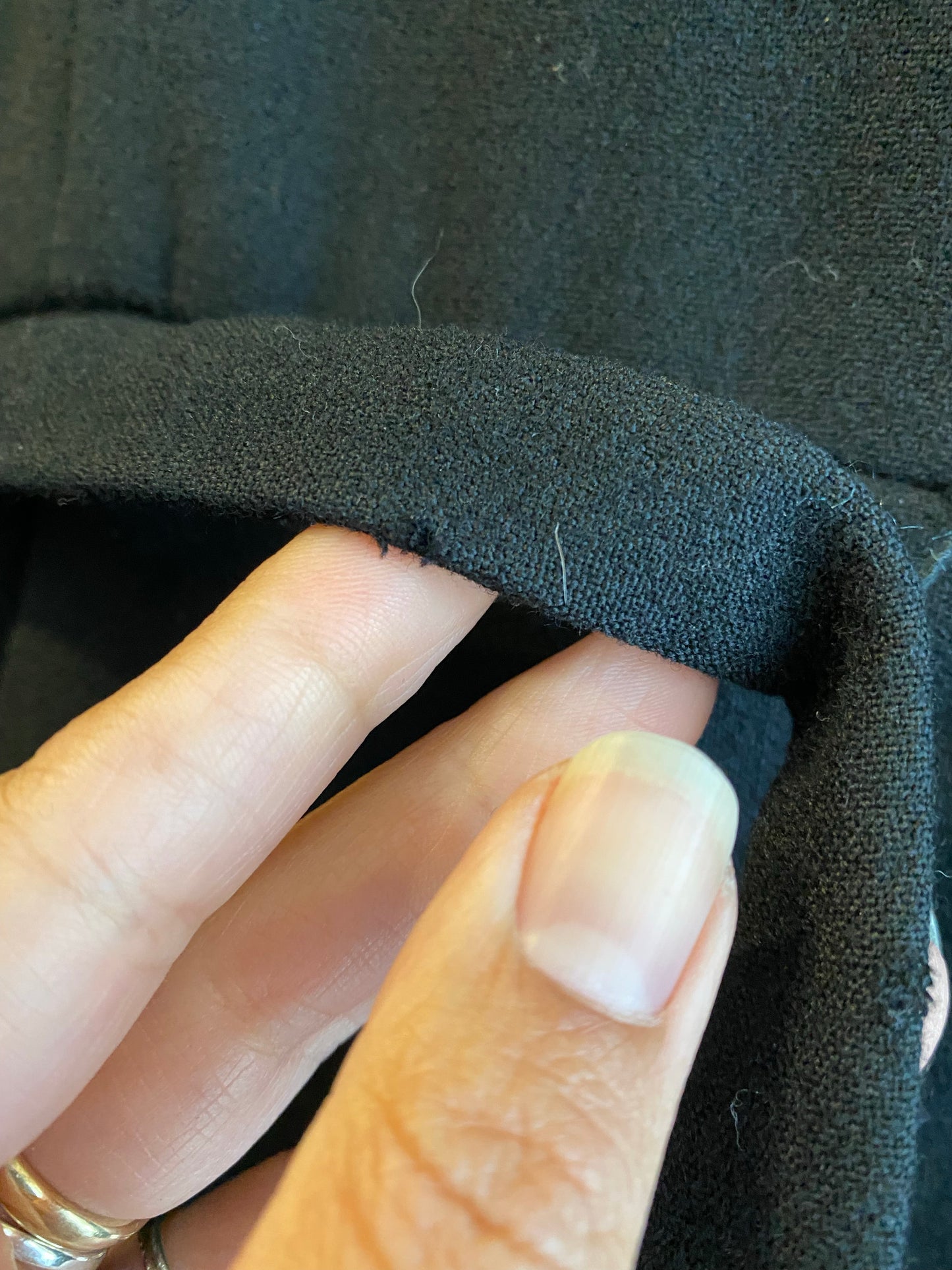 Archival Geoffrey Beene black dress — laid flat showing full garment